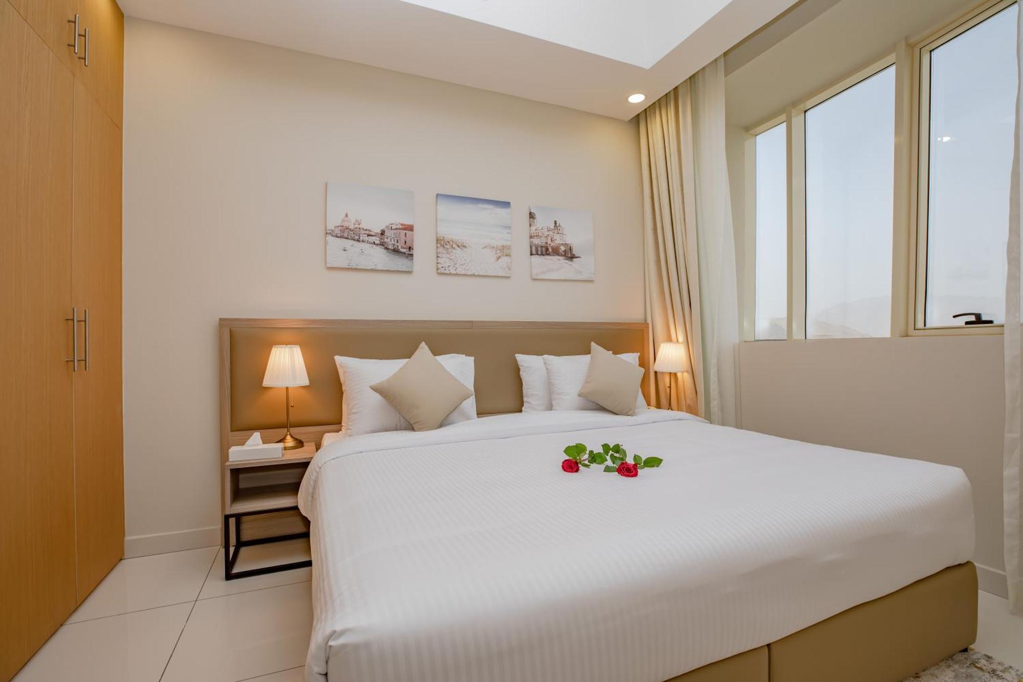 Platinum Coast Hotel Apartments Φουτζάυρα Δωμάτιο φωτογραφία A bedroom in a hotel